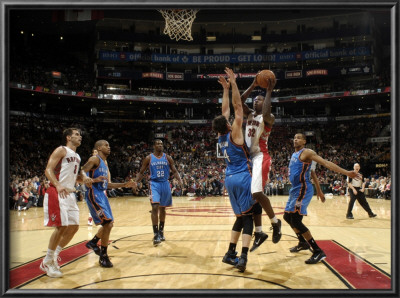 Oklahoma City Thunder V Toronto Raptors: Ed Davis And Nick Collison by Ron Turenne Pricing Limited Edition Print image