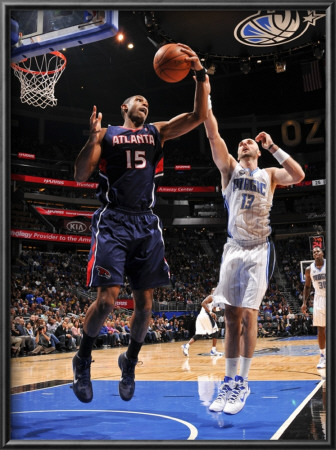 Atlanta Hawks V Orlando Magic: Al Horford And Marcin Gortat by Fernando Medina Pricing Limited Edition Print image