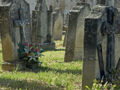 Gravestones At Odd Angles In A Cemetery In Provence, France by Stephen Sharnoff Pricing Limited Edition Print image