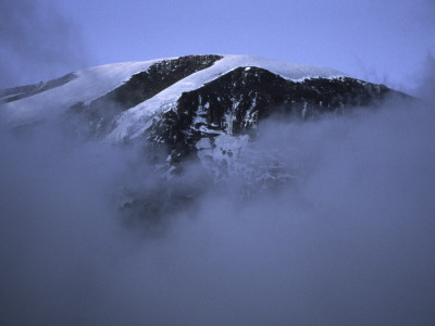 A Foggy Look At Mountain Summit, Kilimanjaro by Michael Brown Pricing Limited Edition Print image