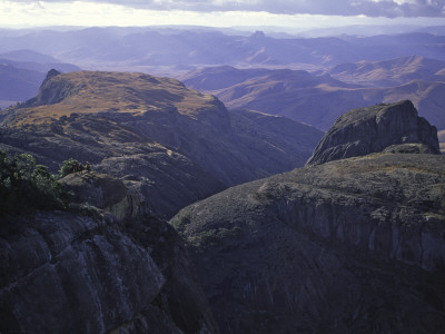 Climbers Checking Out Mountain Tops, Madagascar by Michael Brown Pricing Limited Edition Print image