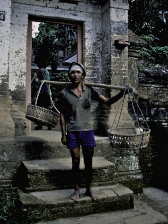 A Fisherman On His Doorstep, Indonesia by Michael Brown Pricing Limited Edition Print image