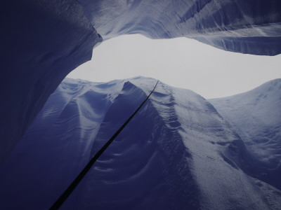 Looking Up Though Glacier With Rope, Chile by Michael Brown Pricing Limited Edition Print image