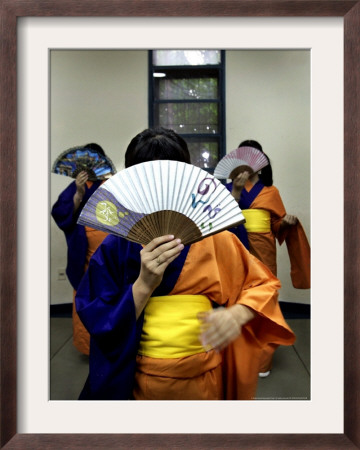 Paraguayan-Japanese Students Practice Traditional Dance In Asuncion, Paraguay, October 24, 2006 by Jorge Saenz Pricing Limited Edition Print image