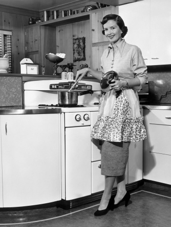 Apron Housewife At Kitchen Stove by George Marks Pricing Limited Edition Print image