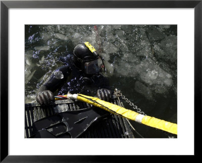 Us Navy Diver Gets Ready To Start His Dive Off The Back Of A Dive Training Boat by Stocktrek Images Pricing Limited Edition Print image