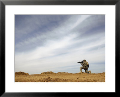 Us Army Sergeant Provides Security During A Patrol Of The Riyahd Village In Iraq by Stocktrek Images Pricing Limited Edition Print image