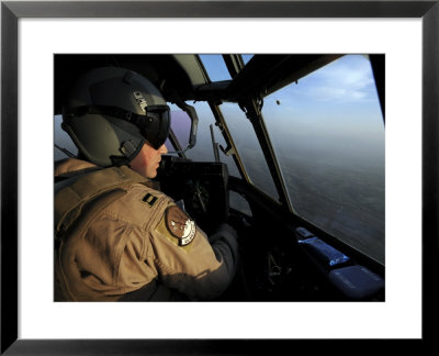 U.S. Air Force C-130J Hercules Pilot Flies A Mission Over Afghanistan by Stocktrek Images Pricing Limited Edition Print image