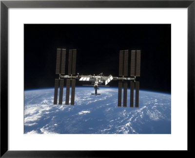 International Space Station Backdropped By Earth's Horizon by Stocktrek Images Pricing Limited Edition Print image