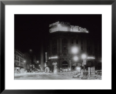 Night City View With Neon Signs Of The New Fiat 500 Located On The Roof Of A Building by A. Villani Pricing Limited Edition Print image