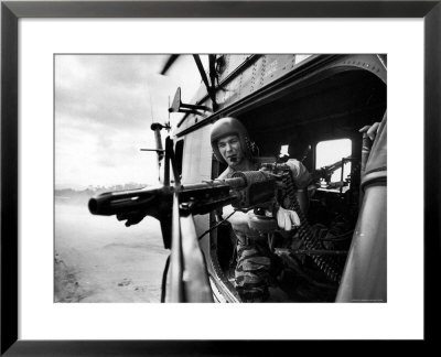 Helicopter Crew Chief James Farley Using M-60 Machine Gun In Landing Zone Near Da Nang by Larry Burrows Pricing Limited Edition Print image