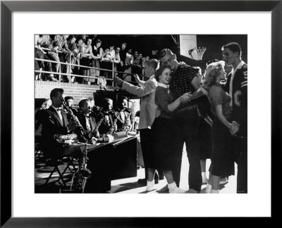 Teenage Couples Without Shoes Dancing At Carlsbad High School Sock Hop by Nina Leen Pricing Limited Edition Print image