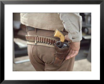 Gun And Holster Belonging To Actor John Wayne During Filming Of Western Movie The Undefeated by John Dominis Pricing Limited Edition Print image