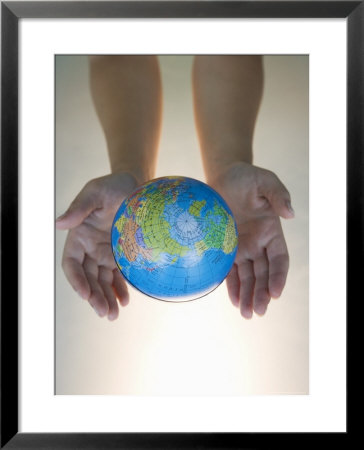 Woman's Hands With World Globe by Angelo Cavalli Pricing Limited Edition Print image