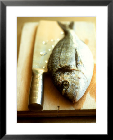Gilthead Bream On A Wooden Board With Cleaver by Michael Paul Pricing Limited Edition Print image