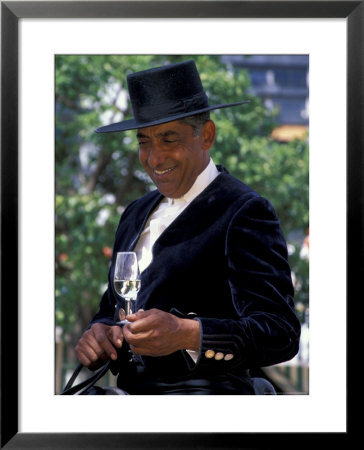 Traditionally Dressed Man On Horseback At Feria De Abril, Sevilla, Spain by John & Lisa Merrill Pricing Limited Edition Print image