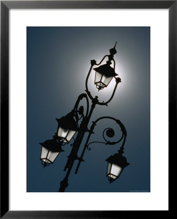Sunlight Behind Lamp Post, Casale Monferrato, Italy by Martin Moos Pricing Limited Edition Print image