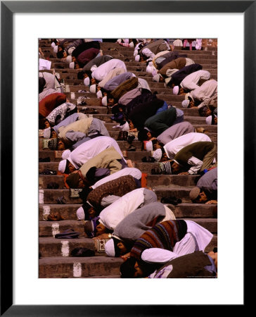 Worshippers Praying On Steps Of Jama Masjid, Delhi, India by Richard I'anson Pricing Limited Edition Print image