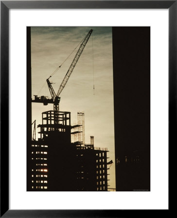 Silhouette Crane At A Skyscraper Construction Site, New York by Ira Block Pricing Limited Edition Print image