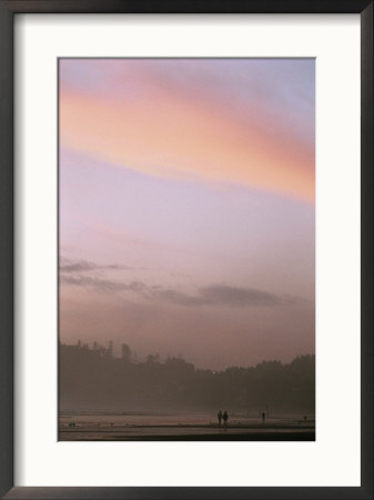 A Distant View Of People Walking On Agate Beach At Twilight by Phil Schermeister Pricing Limited Edition Print image