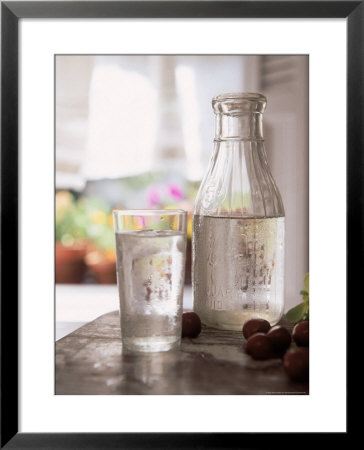 Glass Of Water Near Garden Window by Jean Bourcart Pricing Limited Edition Print image