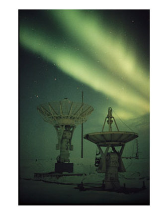 Antennas Point Skyward Under The Glowing Aurora Borealis by Norbert Rosing Pricing Limited Edition Print image