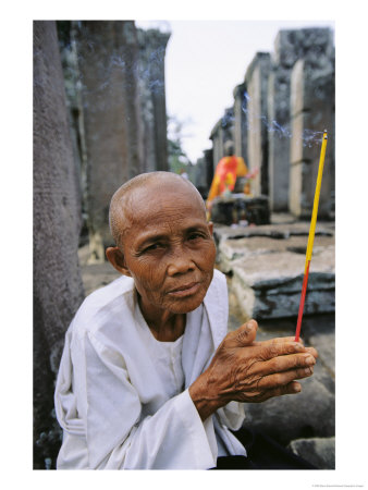 Offerings Made To Buddha At An Angkor Wat Temple by Steve Raymer Pricing Limited Edition Print image