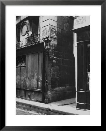 Man Standing On A Balcony Over A Lamp Post On The Rue De La Huchette by David Scherman Pricing Limited Edition Print image