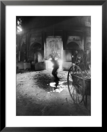 Man Working The Furnace At The Corning Glass Manufacturing Plant by Margaret Bourke-White Pricing Limited Edition Print image