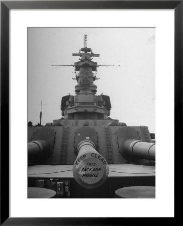 The Battleship South Dakota Resting In The Ship Storage Yard With It's Guns Sealed by Sam Shere Pricing Limited Edition Print image