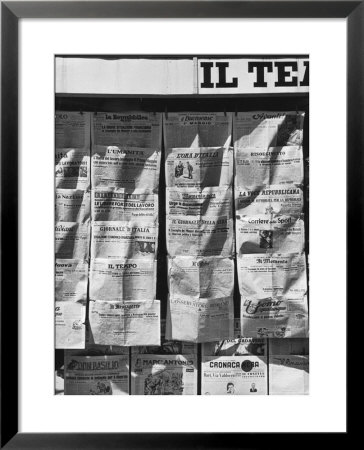 Newspaper Kiosk With An Array Of Journals Representing A Wide Spectrum Of Political Thought by Alfred Eisenstaedt Pricing Limited Edition Print image