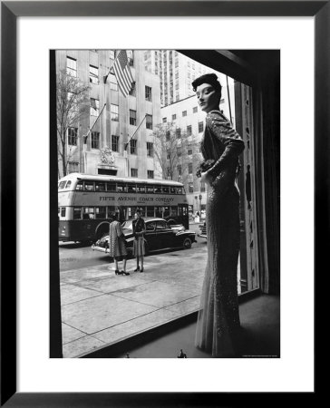 Women Standing On Sidewalk Of 5Th Avenue Across From Window Of Saks Department Store by Alfred Eisenstaedt Pricing Limited Edition Print image