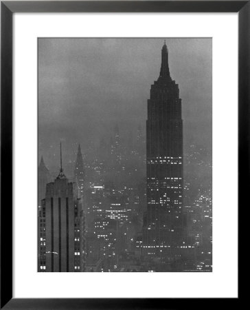 Silhouette Of The Empire State Building And Other Buildings Without Light During Wartime by Andreas Feininger Pricing Limited Edition Print image