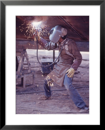 Welder At The Promecan Shipyard, Lima, Peru by Bill Ray Pricing Limited Edition Print image
