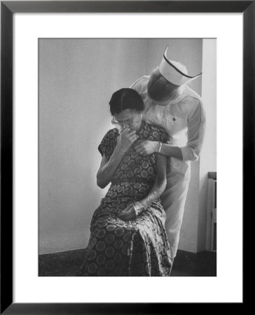 Nurse Trying To Comfort An Elderly Patient by Carl Mydans Pricing Limited Edition Print image
