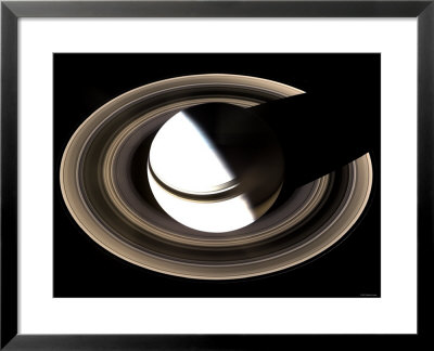 Saturn Sits Enveloped By The Full Splendor Of Its Stately Rings by Stocktrek Images Pricing Limited Edition Print image