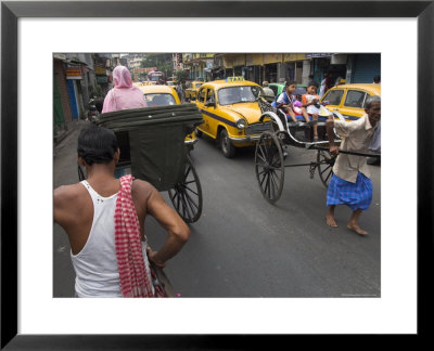 Hand Pulled Rickshaws And Yellow Taxis, Kolkata, West Bengal State, India by Eitan Simanor Pricing Limited Edition Print image