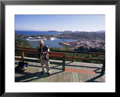 Man Playing A Saxophone At Morne Fortune, With A View Over Castries, St. Lucia, West Indies by Yadid Levy Pricing Limited Edition Print image