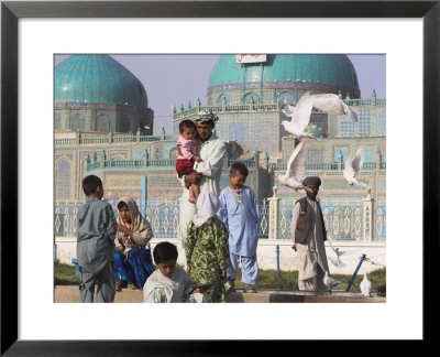 Family Feeding The Famous White Pigeons, Shrine Of Hazrat Ali, Mazar-I-Sharif, Afghanistan by Jane Sweeney Pricing Limited Edition Print image