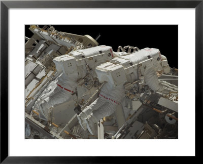 Astronauts Participate In The Sts-117 Mission's Fourth And Final Spacewalk by Stocktrek Images Pricing Limited Edition Print image