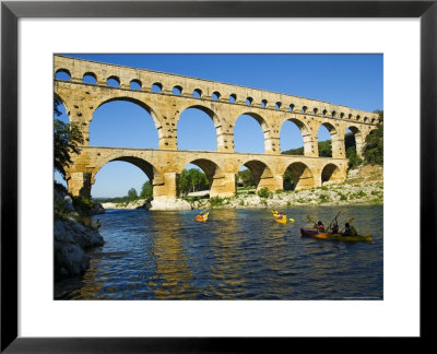 Canoeing Near Pont Du Gard by Glenn Beanland Pricing Limited Edition Print image