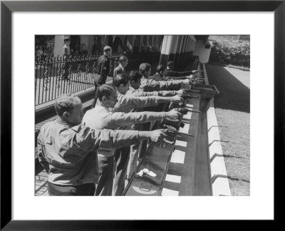 Revolvers Being Used By Police Class During Target Practice At Los Angeles City College by Peter Stackpole Pricing Limited Edition Print image