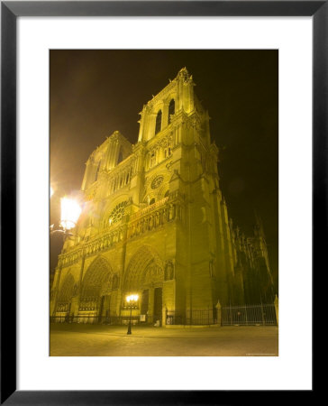 Exterior Of Notre Dame Cathedral At Night, Paris, France by Jim Zuckerman Pricing Limited Edition Print image