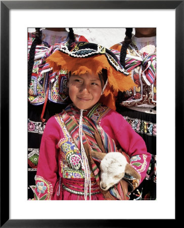 Portrait Of A Local Smiling Peruvian Girl In Traditional Dress, Holding A Young Animal, Cuzco, Peru by Gavin Hellier Pricing Limited Edition Print image