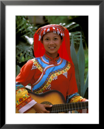 Ethnic Dancer Playing Guitar, Kunming, Yunnan Province, China by Bill Bachmann Pricing Limited Edition Print image