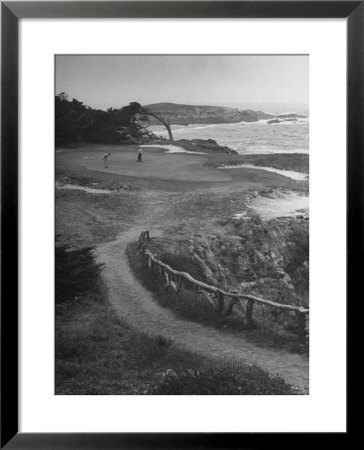 Two Golfers Playing On A Putting Green At Pebble Beach Golf Course by Nina Leen Pricing Limited Edition Print image