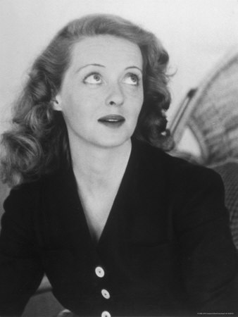 Actress Bette Davis Relaxing In Her Playroom At Home by Alfred Eisenstaedt Pricing Limited Edition Print image