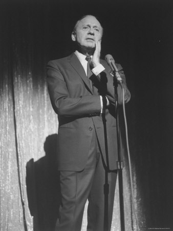 Comedian Jack Benny Exuding His Famous Puzzled Look While Performing At The Ziegfeld Theater by Yale Joel Pricing Limited Edition Print image
