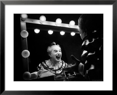 Charlie Chaplin At Dressing Room Mirror, Giving Himself A Wide Grin by W. Eugene Smith Pricing Limited Edition Print image