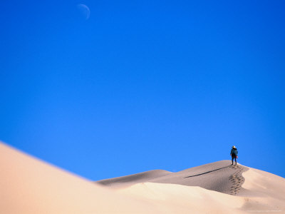 Hiker Trekking Over Sand Dunes Near Lake Mungo, Mungo National Park, Australia by Trevor Creighton Pricing Limited Edition Print image